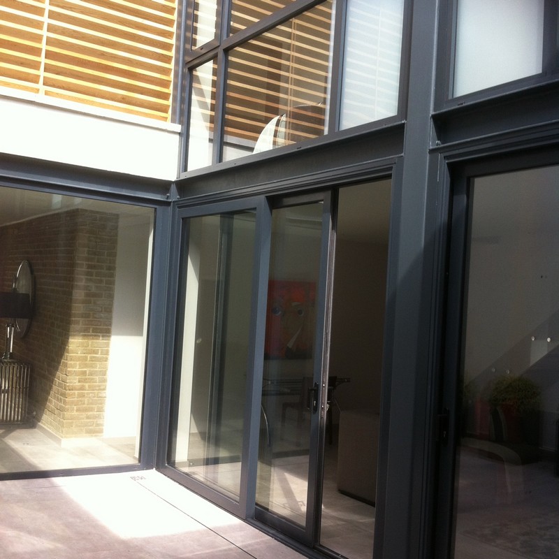 Anthracite aluminium sliding patio doors fitted in Kensington