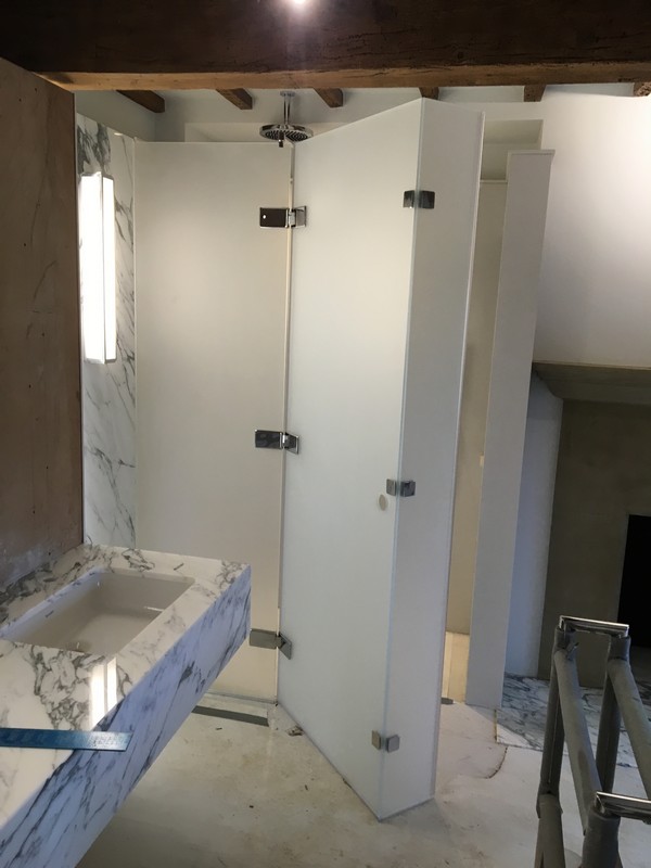 Bespoke frosted glass shower enclosure in Kensington luxury bathroom